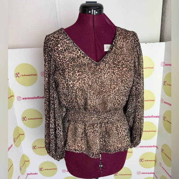 1. State Tops - Leopard Print V-Neck Women's Top